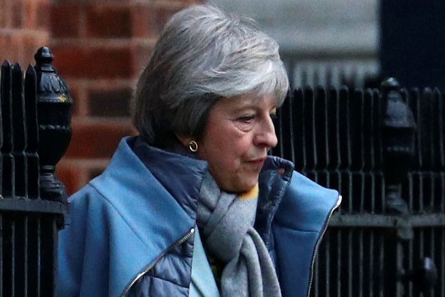 Britain's Prime Minister Theresa May leaves Downing Street, London. Reuters