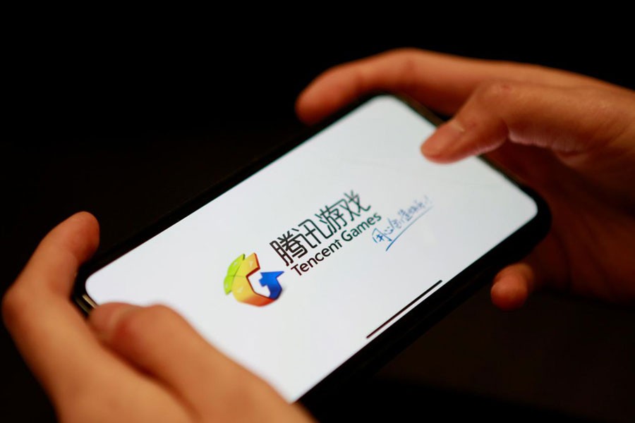 FILE PHOTO: A Tencent Games logo from an app is seen on a mobile phone in this illustration picture taken November 5, 2018 - REUTERS/Florence Lo/Illustration/File Photo