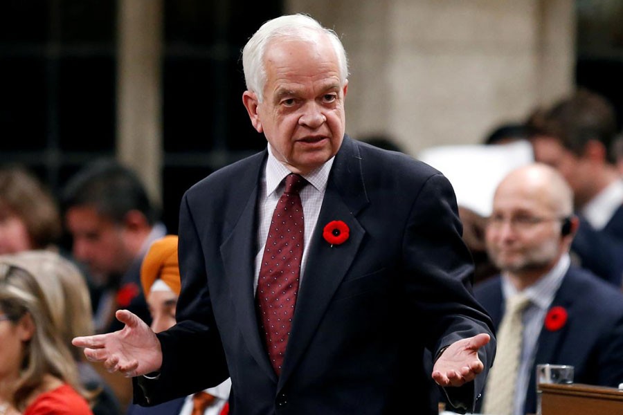 FILE PHOTO: Canada's Immigration Minister John McCallum speaks during Question Period in the House of Commons on Parliament Hill in Ottawa, Ontario, Canada October 31, 2016 - REUTERS/Chris Wattie