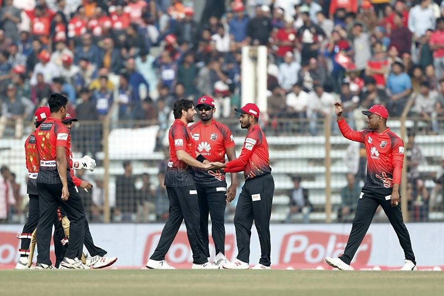 Comilla Victorians' Pakistani all-rounder Shahid Afridi celebrating with teammates after getting a wicket in the BPL match against Chittagong Vikings at the Zahur Ahmed Chowdhury Stadium in Chattogram on Tuesday	— BCB