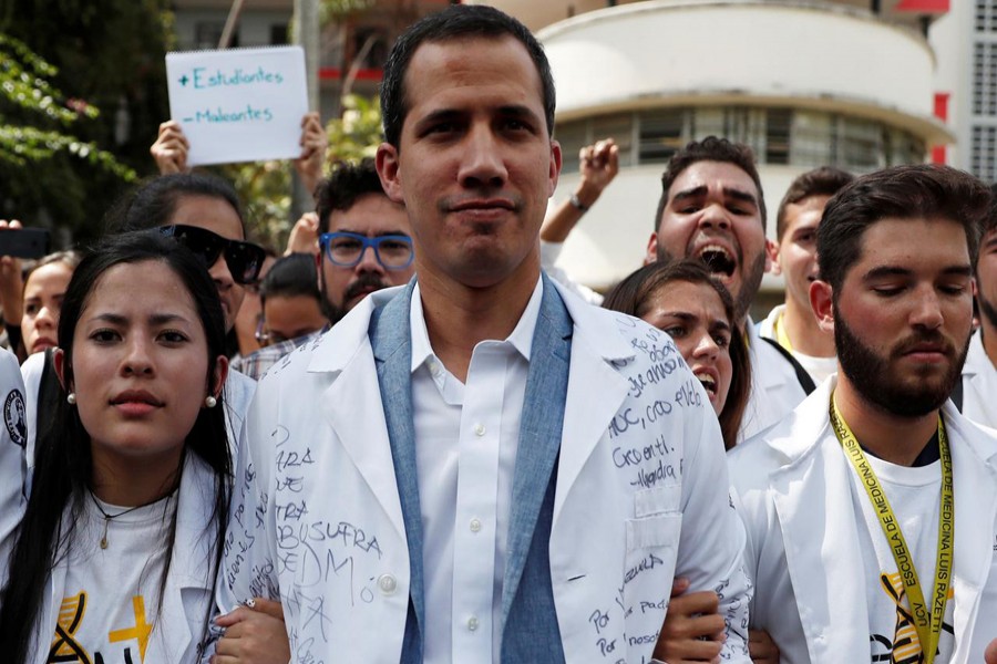 Venezuelan opposition leader and self-proclaimed interim president Juan Guaido takes part in a protest against Venezuelan President Nicolas Maduro's government in Caracas, Venezuela January 30, 2019. Reuters