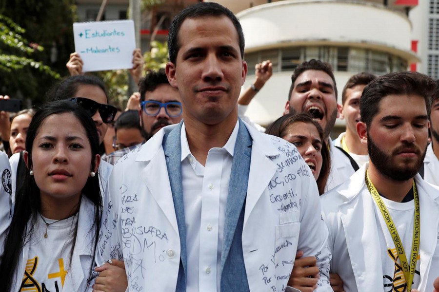 Venezuelan opposition leader and self-proclaimed interim president Juan Guaido takes part in a protest against Venezuelan President Nicolas Maduro's government outside a hospital in Caracas, Venezuela January 30, 2019. Reuters