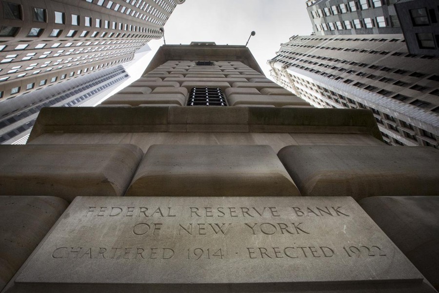 The corner stone of The New York Federal Reserve Bank is seen surrounded by financial institutions in New York's financial district, March 25, 2015. Reuters/Files