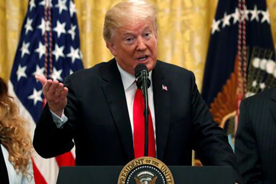 US President Donald Trump holds a news conference to mark six months since the passage of the Tax Cuts and Jobs Act, in the White House East Room in Washington, US, June 29, 2018. Reuters/File Photo