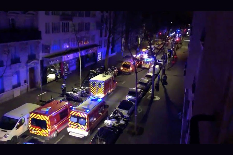 Emergency vehicles line a street where a residential building had caught fire in Paris, France, February 5, 2019, in this still image taken from a social media video - Pierre-Alexandre Vezinet/via REUTERS