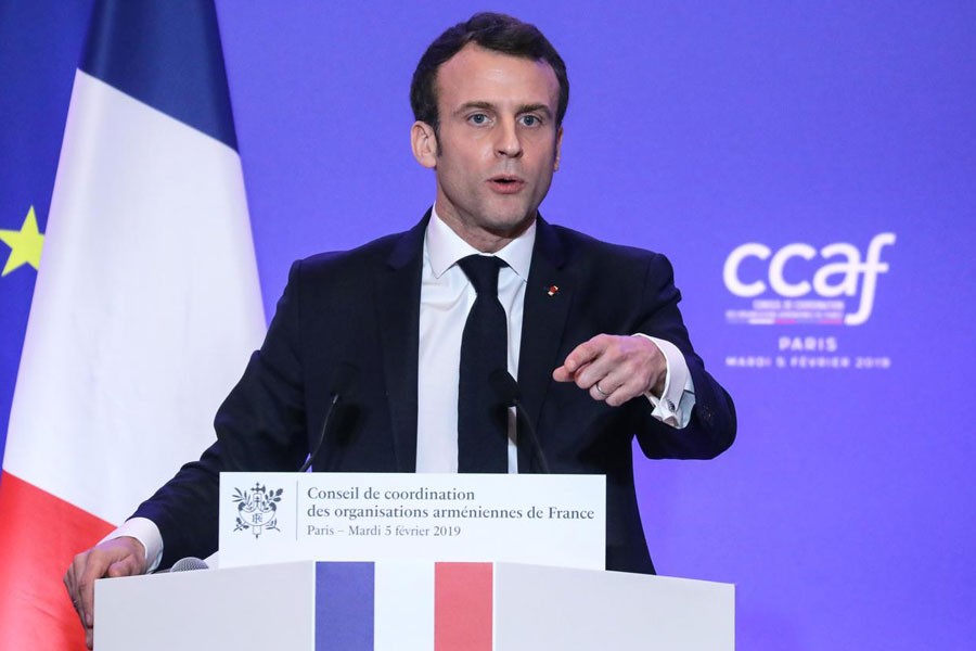 French President Emmanuel Macron speaks during the Co-ordination Council of Armenian Organisations of France (CCAF) annual dinner in Paris, France February 5, 2019 - Ludovic Marin/Pool via REUTERS