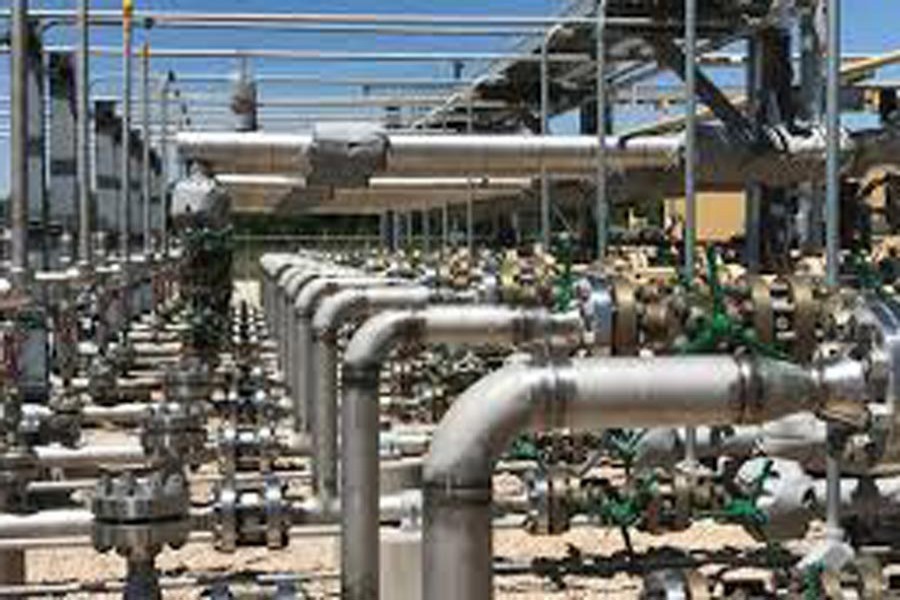 Equipment used to process carbon dioxide, crude oil and water is seen at an Occidental Petroleum Corp enhanced oil recovery project in Hobbs, New Mexico, US 	— Reuters