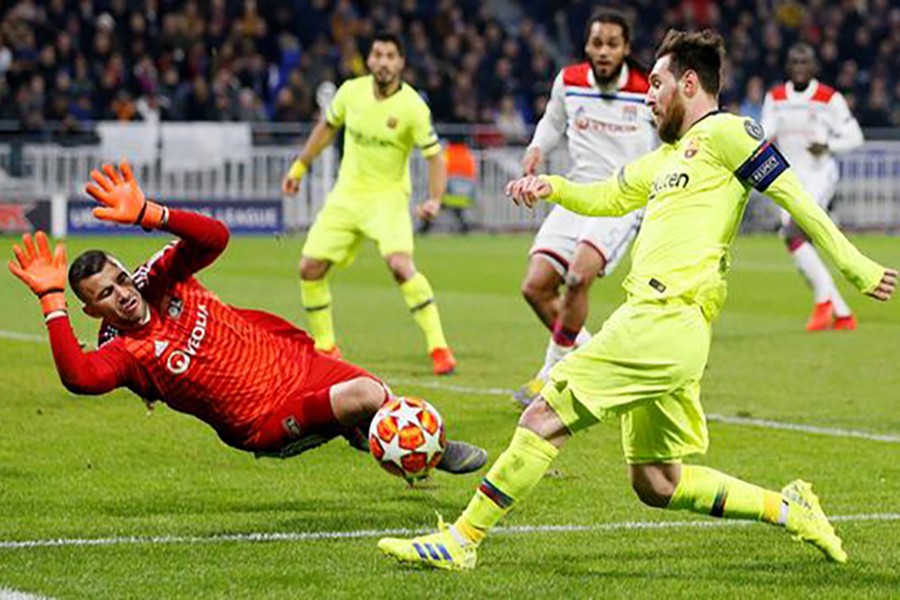 Lyon goalkeeper Anthony Lopes comes out to smother the danger from Barcelona talisman Lionel Messi — Reuters photo