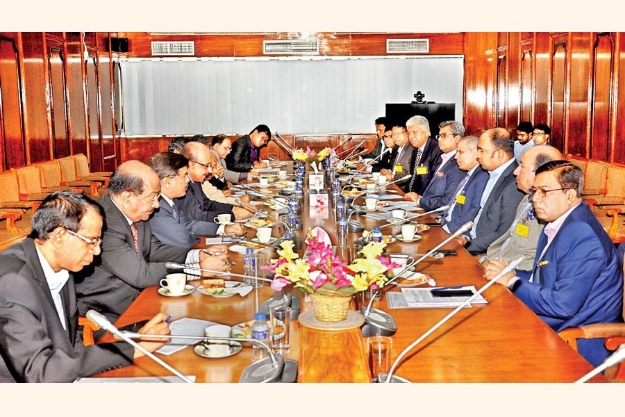 FBCCI leaders and high officials of the Bangladesh Bank are seen in a meeting held in Dhaka on Wednesday — FBCCI Photo