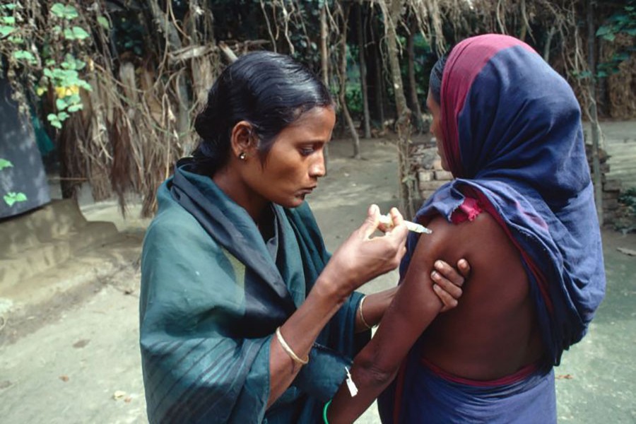 A Bangladesh woman gets an injection of a long-acting contraceptive. Photo: Collected