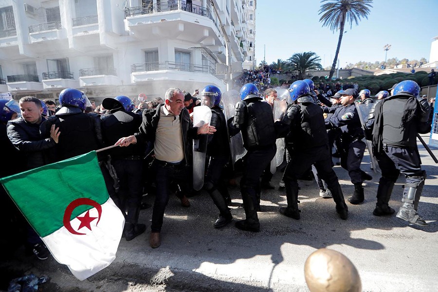 Police officers try to disperse people trying to reach the government palace during a protest against the President Abdelaziz Bouteflika's plan to extend his 20-year rule by seeking a fifth term in April elections in Algiers, Algeria on March 1, 2019 — Reuters photo