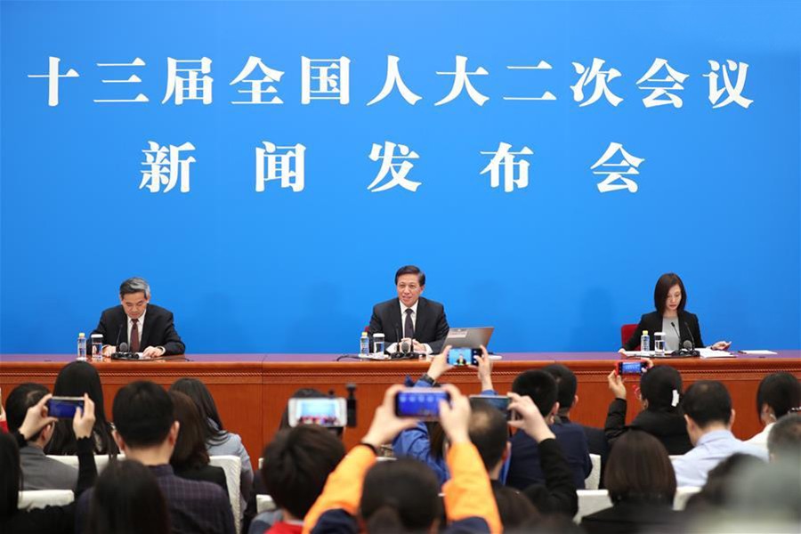 Zhang Yesui (C), spokesperson for the second session of the 13th National People's Congress (NPC), speaks during a press conference on the agenda of the session and the work of the NPC at the Great Hall of the People in Beijing, China on March 4, 2019 — Xinhua photo