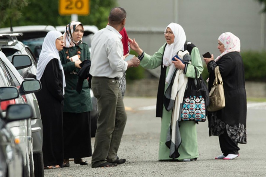 Members of a family react outside the mosque following a shooting at the Al Noor mosque in Christchurch, New Zealand on March 15, 2019 — Reuters photo