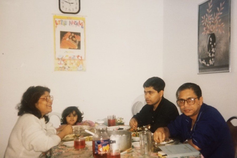 The photo shows Masud Karim wearing glasses and in front of him is Dilara Alo and next to him are his son Sohel and grand daughter
