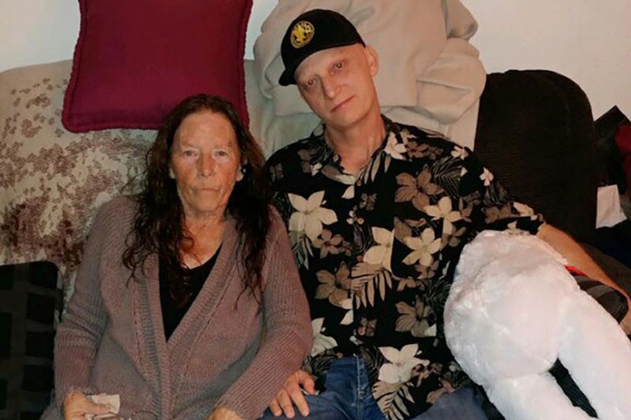 Michael White of California poses with his mother Joanne in an undated family photo released in Washington, US March 16, 2019 - White family/Handout via REUTERS
