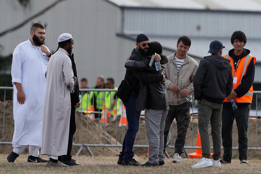 Relatives and other people arrive to attend the burial ceremony of the victims of the mosque attacks, at the Memorial Park Cemetery in Christchurch, New Zealand on March 20, 2019 — Reuters photo