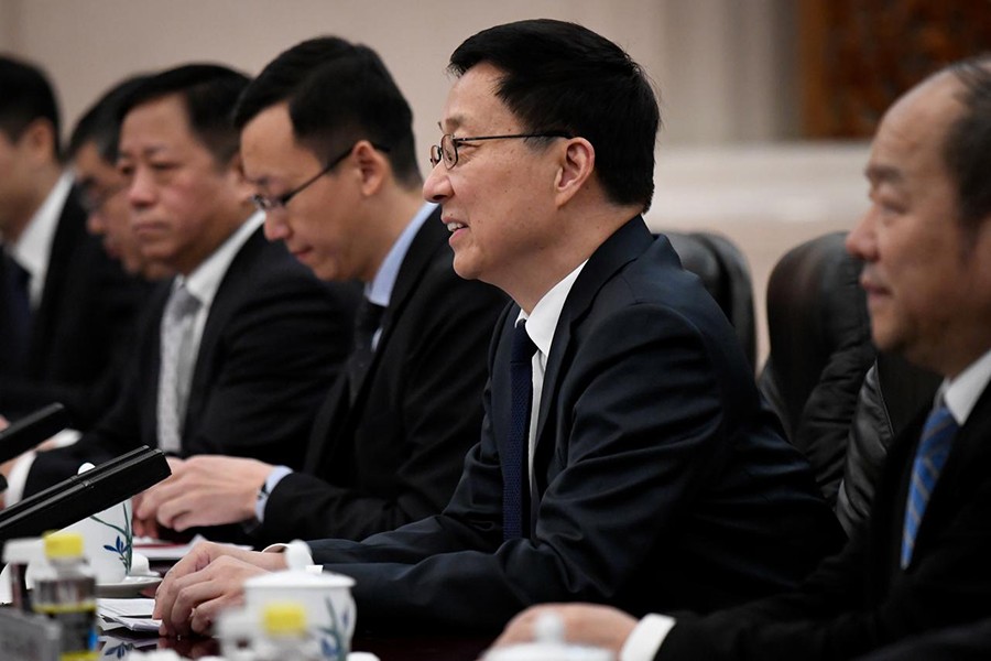 Chinese Vice Premier Han Zheng (second from right) speaks during a meeting at the Great Hall of the People in Beijing, China in this undated Reuters photo