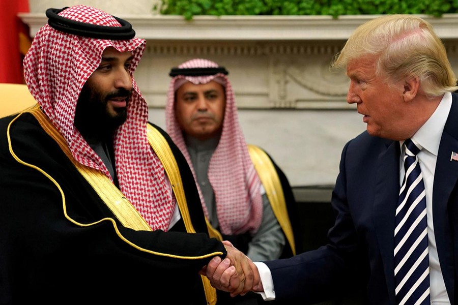 US President Donald Trump shakes hands with Saudi Arabia's Crown Prince Mohammed bin Salman in the Oval Office at the White House in Washington, US on March 20, 2018 — Reuters/File