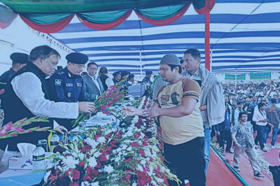 Home Minister Asaduzzaman Khan Kamal hands out flowers to a listed drug trader during a surrender ceremony  on February 16, 2019 on the premises of Teknaf Model Primary School in Cox's Bazar:  "This public display of the commitment of the government to help rehabilitate the wrongdoers is  commendable and should be appreciated. However, one also must recognise that the contemporary addiction problem is a highly complicated socio-economic phenomenon."