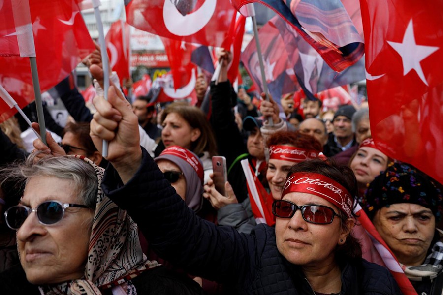 Supporters of the main opposition Republican People's Party (CHP) mayoral candidate Ekrem Imamoglu wave Turkish flags and portraits of Mustafa Kemal Ataturk, founder of secular Turkey, during a rally for the local elections in Istanbul, Turkey on March 30, 2019 — Reuters photo