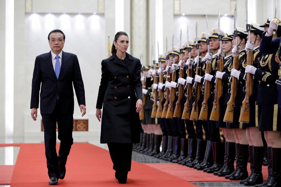 New Zealand Prime Minister Jacinda Ardern (R) and China's Premier Li Keqiang attend a welcome ceremony at the Great Hall of the People in Beijing, China, April 1, 2019. Reuters