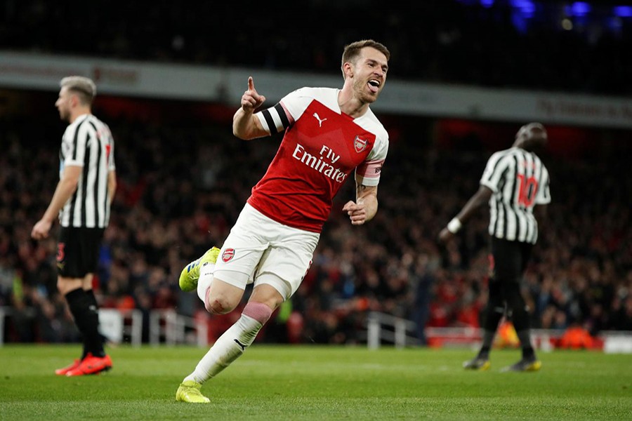 Arsenal's Aaron Ramsey celebrates scoring their first goal during the clash against Newcastle United at the Emirates Stadium on Monday — Reuters action image