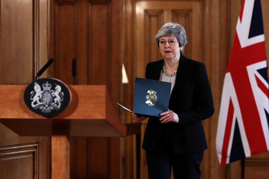 British Prime Minister Theresa May holds documents at a news conference outside Downing Street, London, Britain on April 2, 2019 — Reuters photo