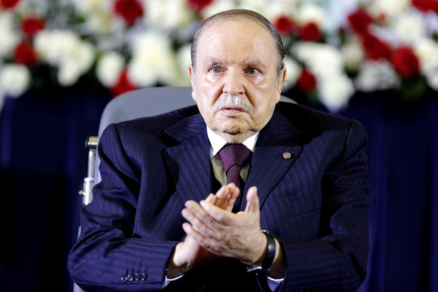 President Abdelaziz Bouteflika claps during a swearing-in ceremony in Algiers on April 28, 2014 — Reuters/Files