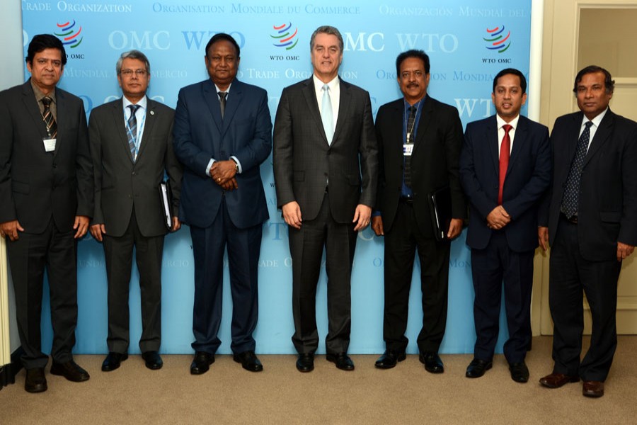 Commerce minister Tipu Munshi and senior officials of Bangladesh delegation are seen with the WTO Director General Roberto Azevêdo at his office in Geneva