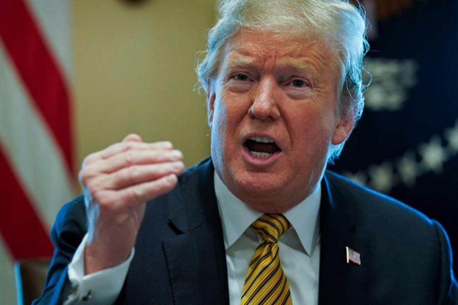 US President Donald Trump speaks during a meeting of the White House Opportunity and Revitalization Council in the Cabinet room at the White House in Washington, US, April 4, 2019. (Reuters)