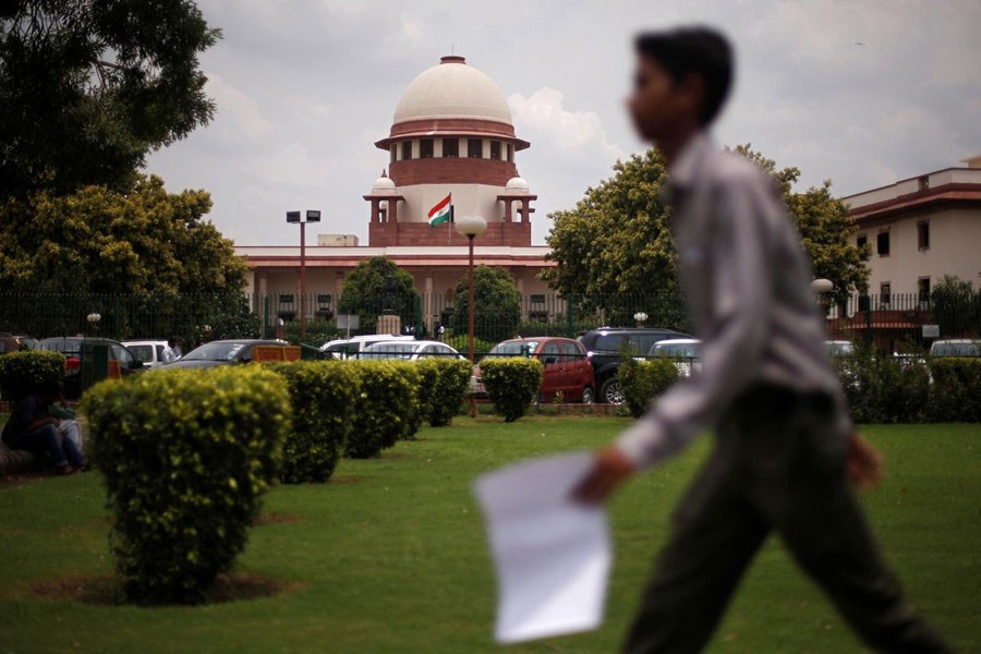 A man walks inside the premises of the Supreme Court in New Delhi, India, July 17, 2018. Reuters/File photo