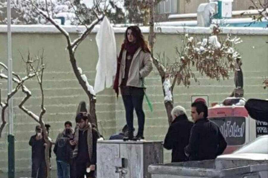 Iranian woman gets jail term for removing scarf