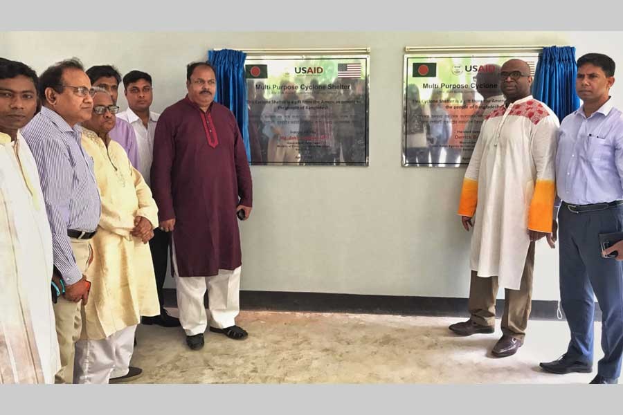 State Minister for Primary and Mass Education Zakir Hossen and USAID Bangladesh Mission Director Derrick Brown inaugurating a new multi-purpose cyclone shelter in Mirzaganj Upazila of Patuakhali district on Thursday
