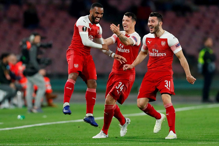 Arsenal's Alexandre Lacazette celebrates scoring their lone goal with teammates — Reuters Action Image