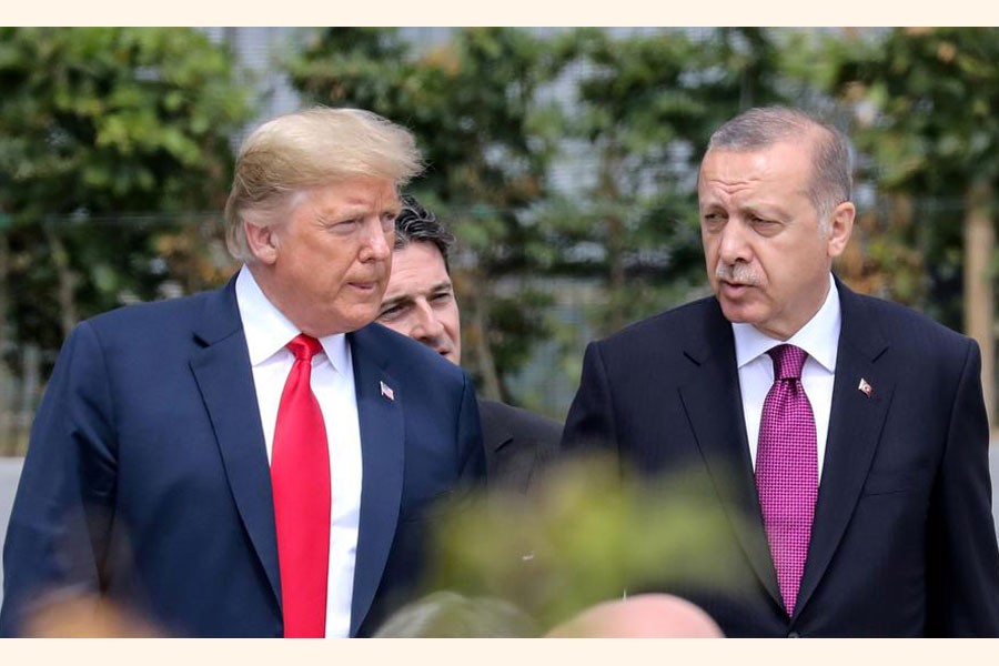 A file photo showing US President Donald Trump (left) talking with Turkey's President Tayyip Erdogan during the opening ceremony of the NATO (North Atlantic Treaty Organisation) summit, at the NATO headquarters in Brussels, Belgium recently	— Reuters