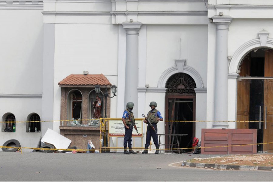 Security personnel stand guard outside St Anthony Shrine, two days after a string of suicide bomb attacks on churches and luxury hotels across the island on Easter Sunday, in Colombo, Sri Lanka, April 23, 2019. Reuters