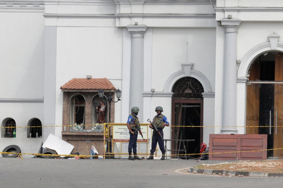 Security personnel stand guard outside St Anthony Shrine, two days after a string of suicide bomb attacks on churches and luxury hotels across the island on Easter Sunday, in Colombo, Sri Lanka on April 23, 2019 — Reuters photo