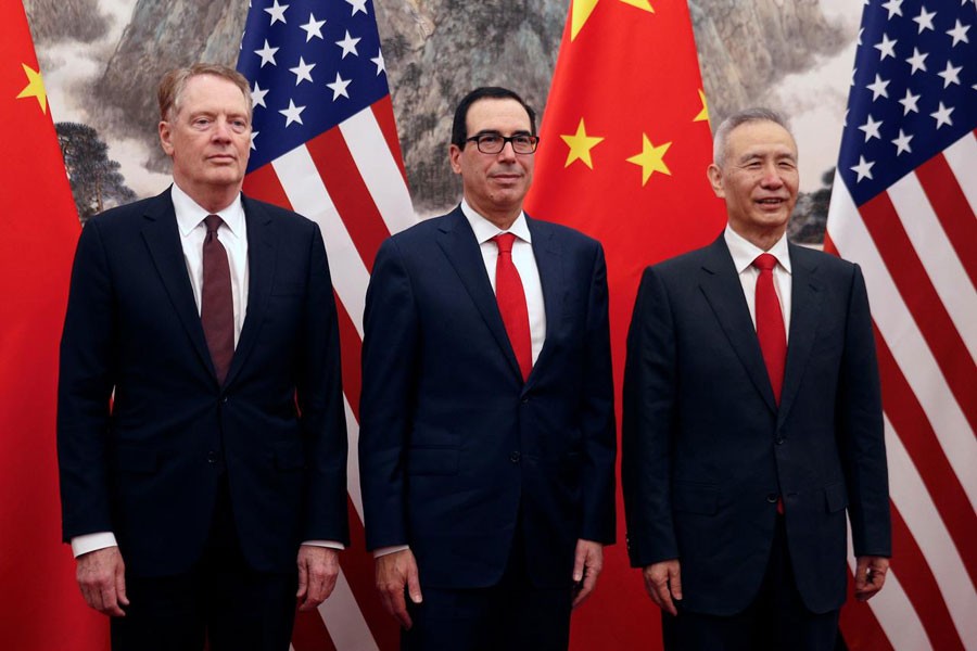 Chinese Vice Premier Liu He, right, poses with US Treasury Secretary Steven Mnuchin, centre, and US Trade Representative Robert Lighthizer, left, before they proceed to their meeting at the Diaoyutai State Guesthouse in Beijing, Wednesday, May 1, 2019. Reuters