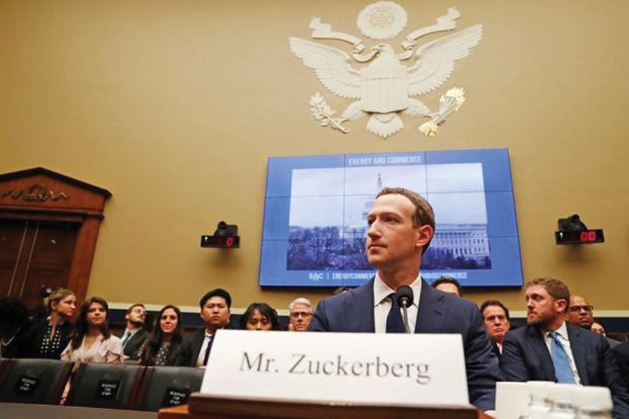 Facebook CEO Mark Zuckerberg testifies before a House Energy and Commerce Committee hearing regarding the company's use and protection of user data on Capitol Hill in Washington on April 18, 2018 in the wake of Facebook-Cambridge Analytica data scandal.           —Photo: Reuters