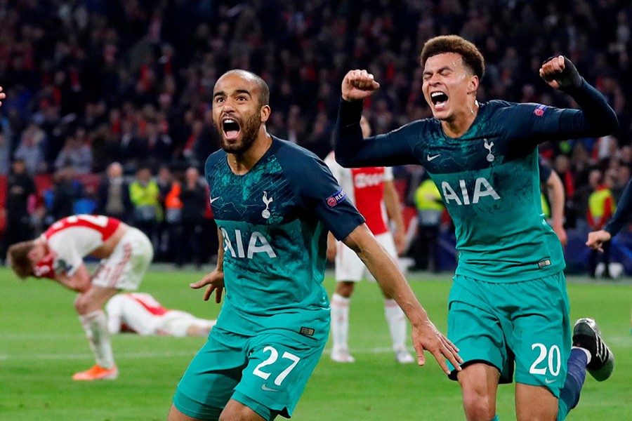 Tottenham's Lucas Moura celebrates scoring their third goal to complete his hat-trick with teamamte Dele Alli — Reuters action image