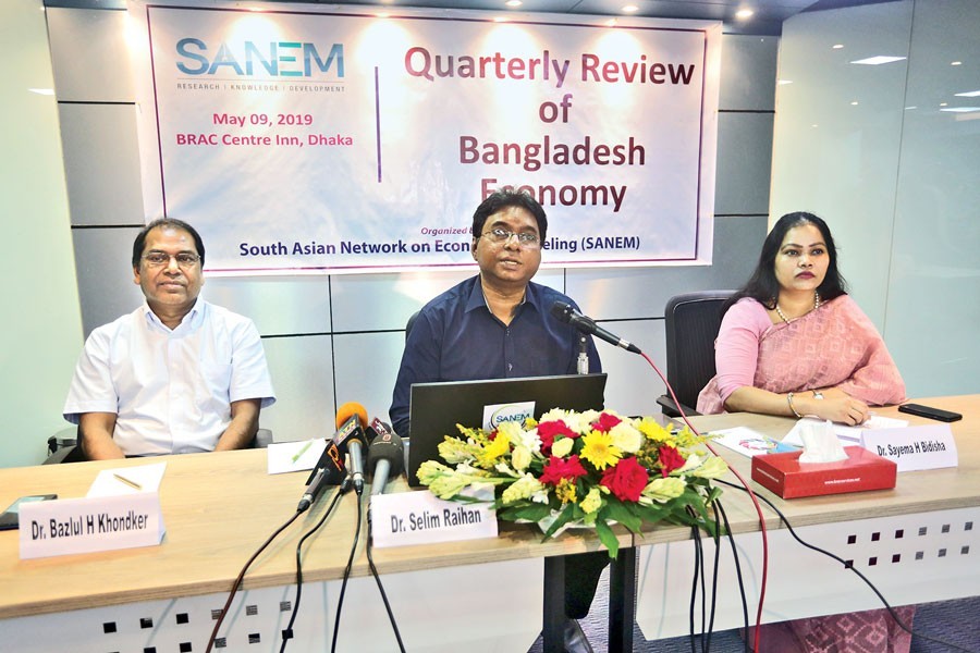 Dr Selim Raihan, executive director of SANEM, speaking at the launching ceremony of 'Quarterly Review of Bangladesh Economy' at Brac Centre Inn in the city on Thursday — FE photo