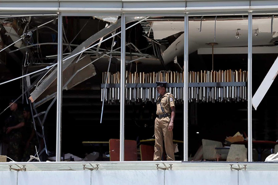 A police officer inspects the explosion area at Shangri-La hotel in Colombo, Sri Lanka on April 21, 2019 — Reuters photo