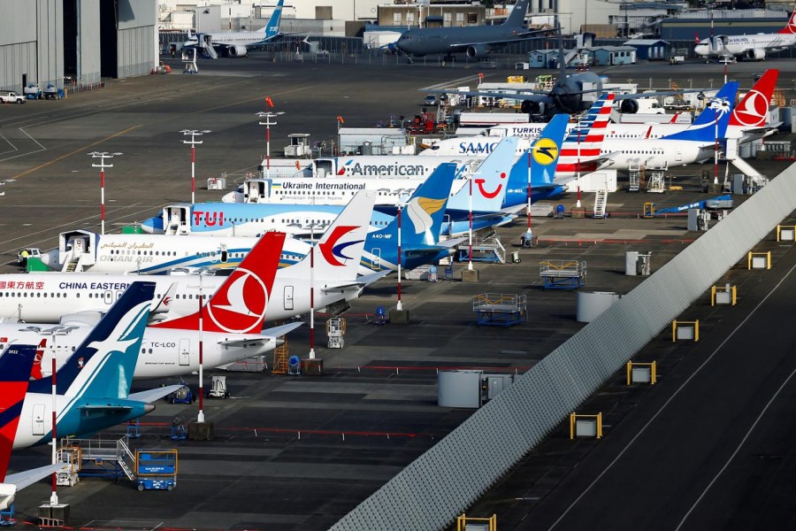 FILE PHOTO: An aerial photo shows several Boeing 737 MAX airplanes grounded at Boeing Field in Seattle, Washington, U.S. March 21, 2019 - REUTERS/Lindsey Wasson