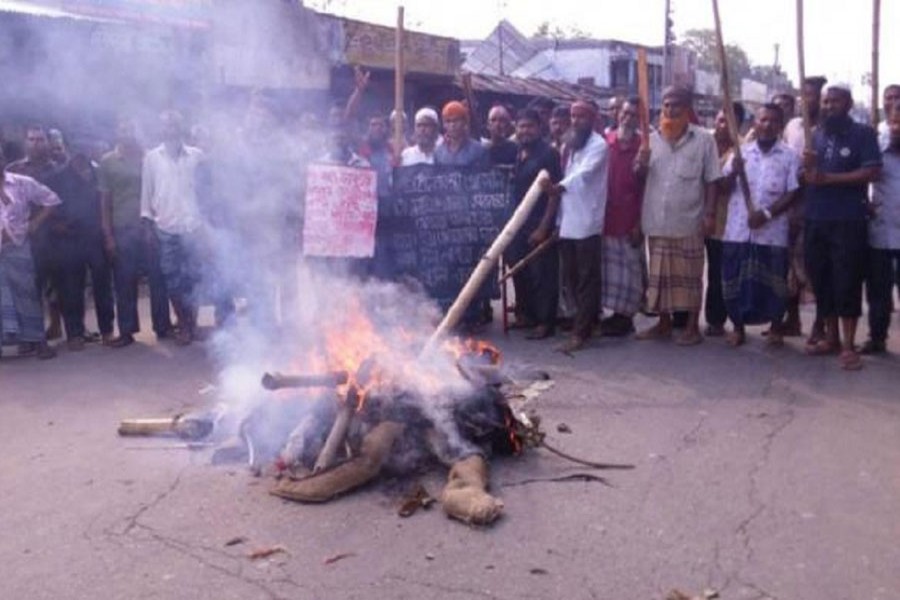 Jute mill workers in a protest demanding pay and their outstanding wages recently