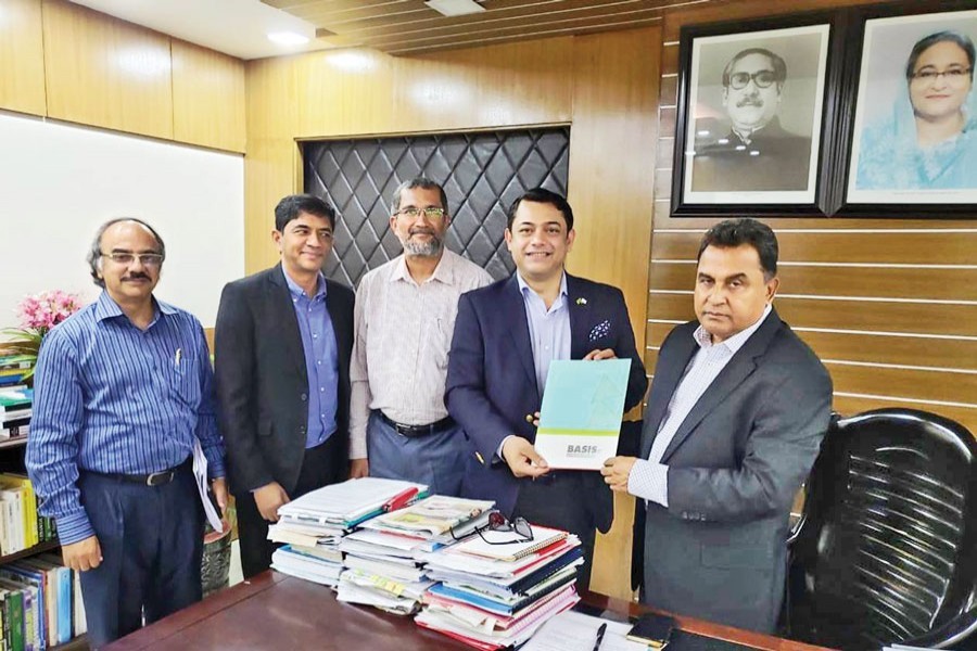 Leaders of Bangladesh Association of Software and Information Services (BASIS) handing over their pre-budget proposal to Finance Minister A H M Mustafa Kamal at the Economic Relations Division in the city on Sunday