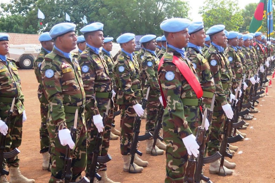 Bangladeshi peacekeepers to United Nations stand to attention at a medal-awarding ceremony — UN Peacekeeping photo used only for representational purpose