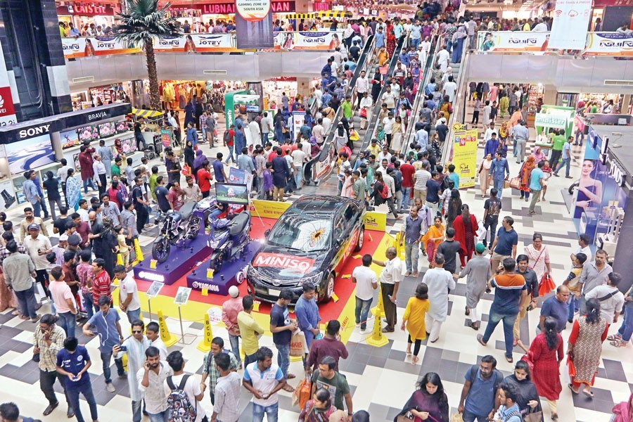 A large number of customers thronging the Bashundhara City shopping mall as elsewhere in the city as the Eid shopping gained momentum on Friday, a weekly holiday — FE Photo