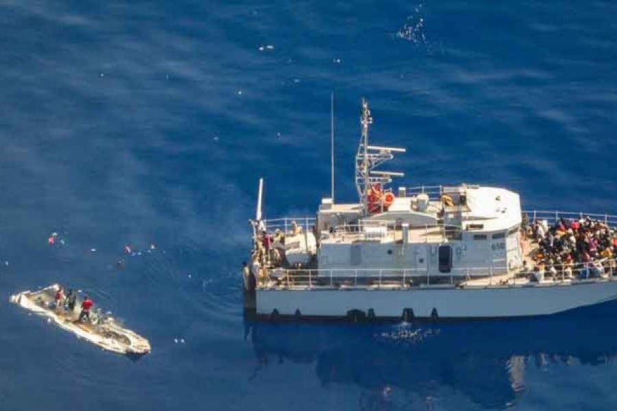 Aerial view shows Libya's coast guard ship with migrants on deck, in Search and Rescue (SAR) zone off Libya's coast May 11, 2019, as seen from Germany's Sea-Watch humanitarian organisation's Moonbird aircraft. Sea-Watch.org/Handout via Reuters