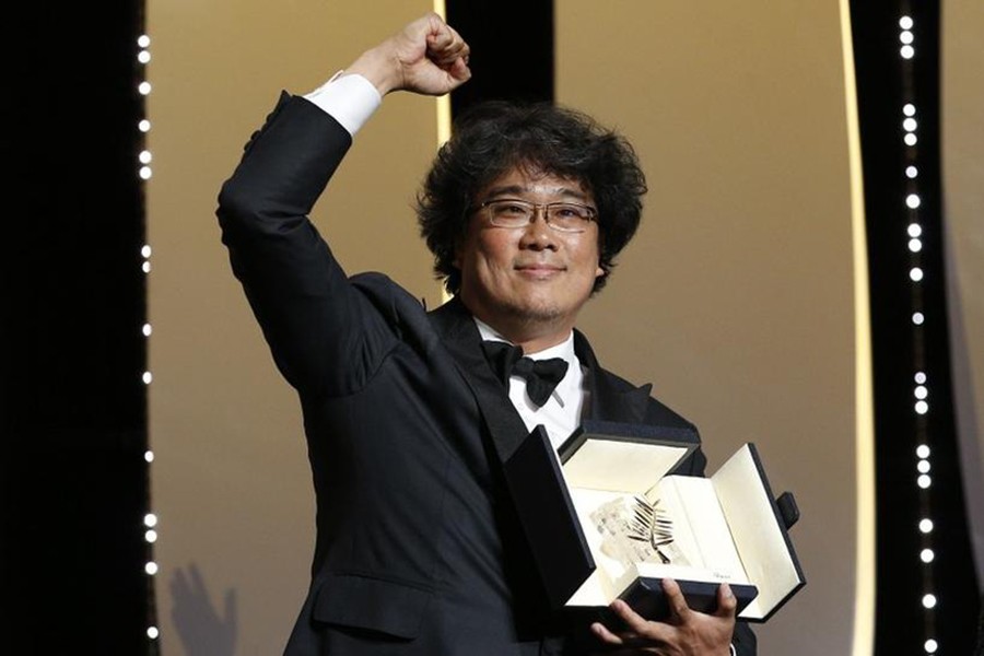 South Korean Director Bong Joon-ho, Palme d'Or award winner for his film "Parasite" (Gisaengchung), reacts after the cnnouncement — Reuters photo