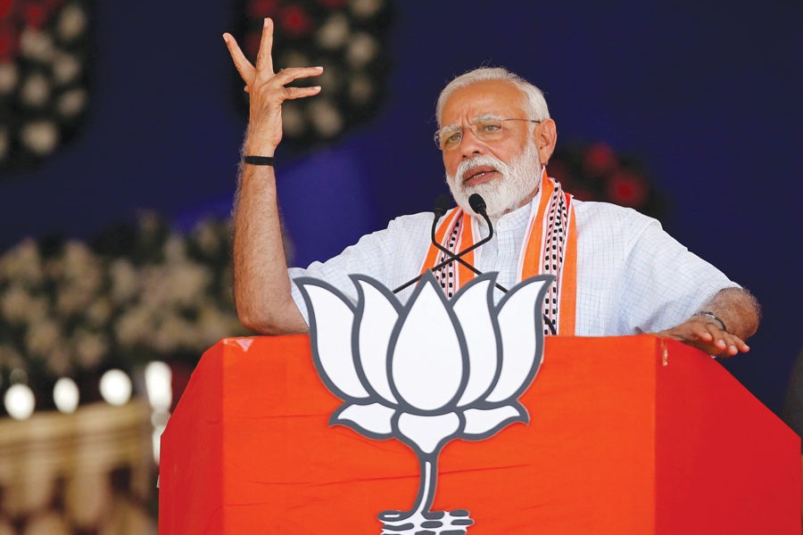 Indian Prime Minister Narendra Modi gestures as he speaks after releasing India's ruling Bharatiya Janata Party (BJP)'s election manifesto for the April/May general election, in New Delhi, on April 8, 2019: "Let us hope that the BJP will now spend the political capital from its landslide victory on changing course, improving democratic governance, and respecting the immense diversity of India's population". — Photo: Reuters